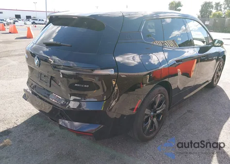 2024 BMW Ix xDrive50 z USA, uszkodzony, nr VIN WB523CF09RCP90639